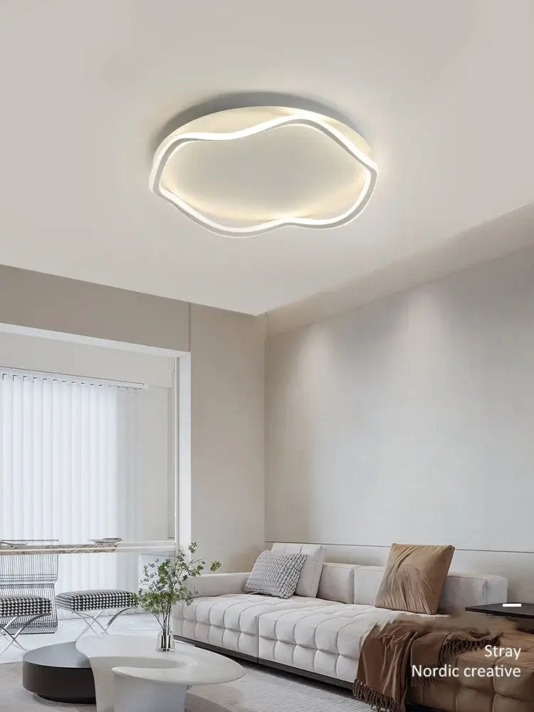 Modern white cloud led ceiling lamp with sleek glowing edge trim for minimalist bedroom ceiling lamp use