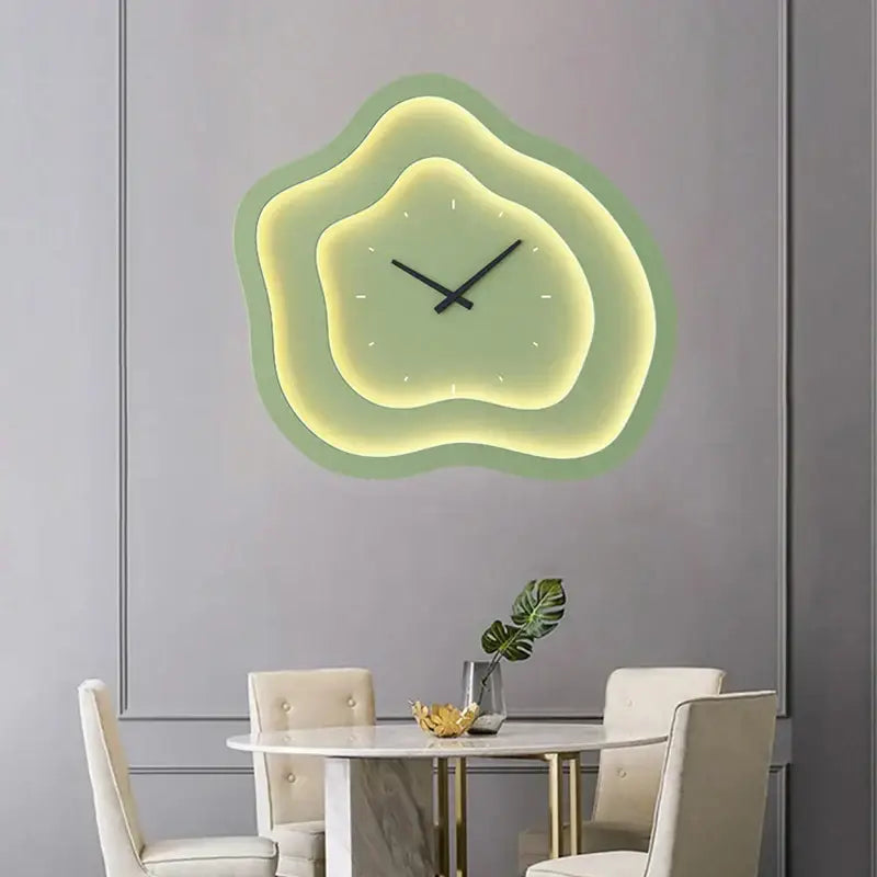 Modern white cloud led wall lamp with a layered organic shape clock in soft green and yellow hues for bedroom use