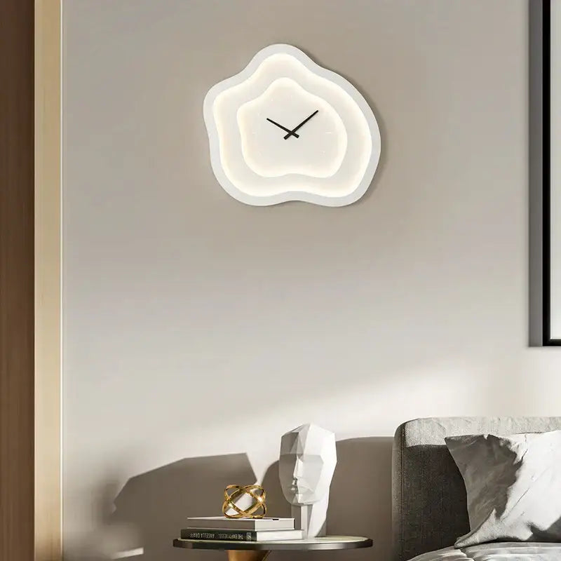 Modern white cloud led wall lamp with glowing illumination and minimalist black hands for bedroom decor