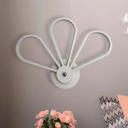 Modern white clover fan wall light with metallic finish featuring sleek design for bedroom wall mount lighting