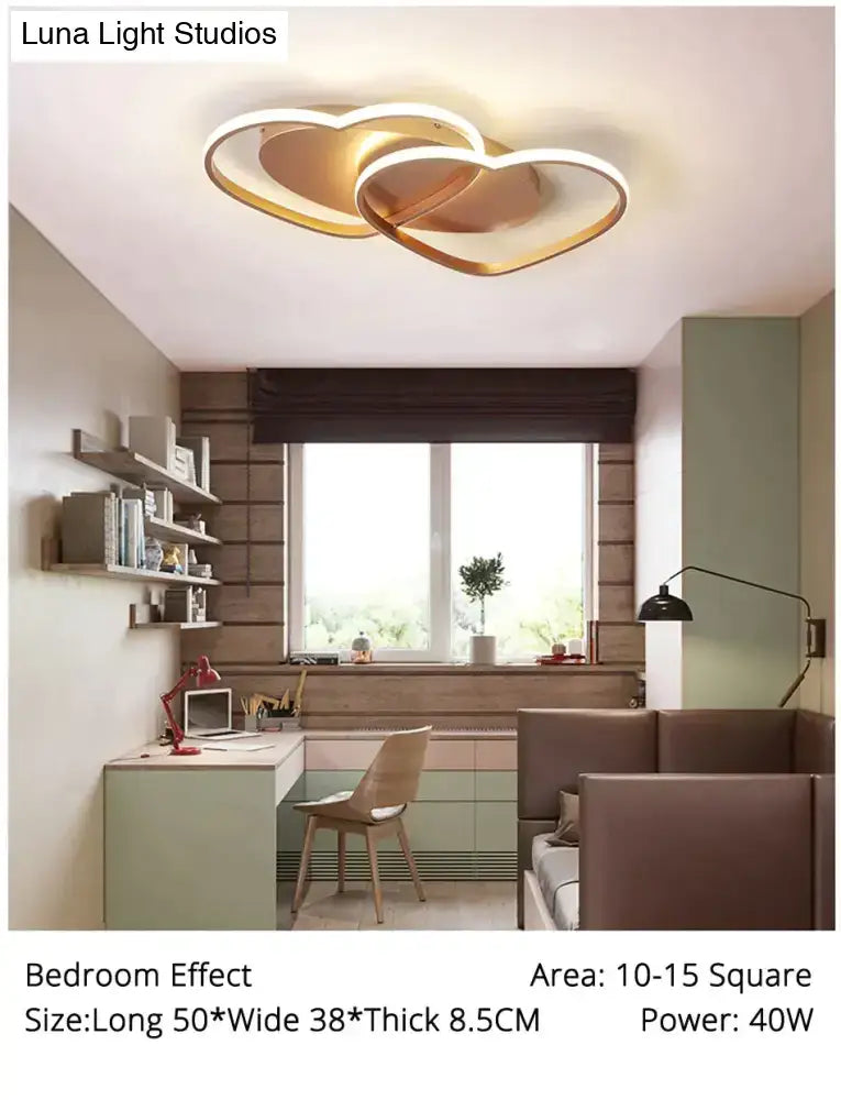 Gold-toned double-heart led ceiling light with modern design, ideal for white coffee pendant lights in bedroom