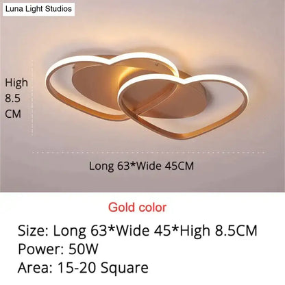 Gold-colored led pendant light with two interlocking heart-shaped frames for modern white coffee bedroom decor