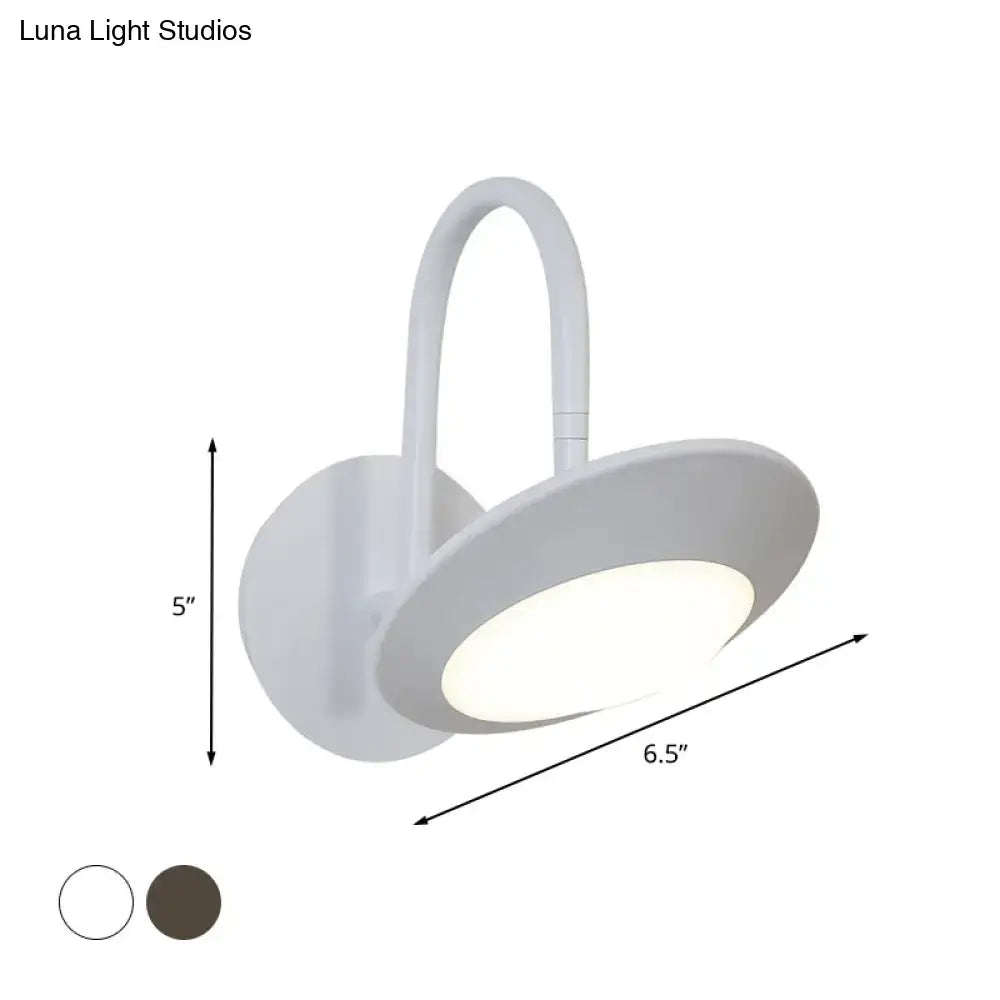 Modern white and coffee wall sconce lamp with rotatable curved gooseneck and circular LED light head for bedroom use