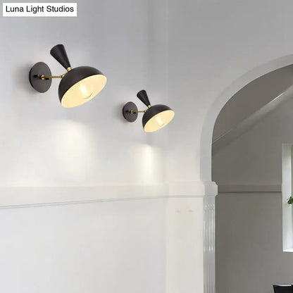 Black and brass dome sconce with conical shades featuring a rotating node design for 110v-120v bedroom lighting