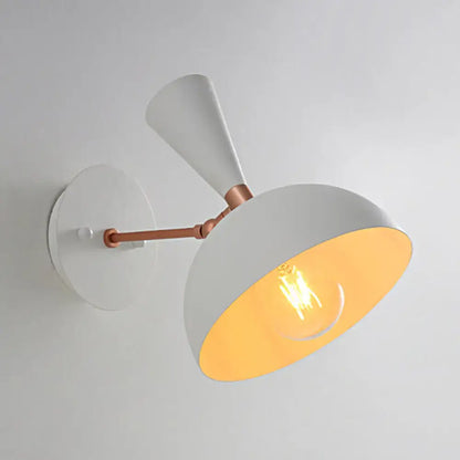 Modern white and copper rotating node dome sconce with two arms and warm filament bulb glow for 110v-120v use
