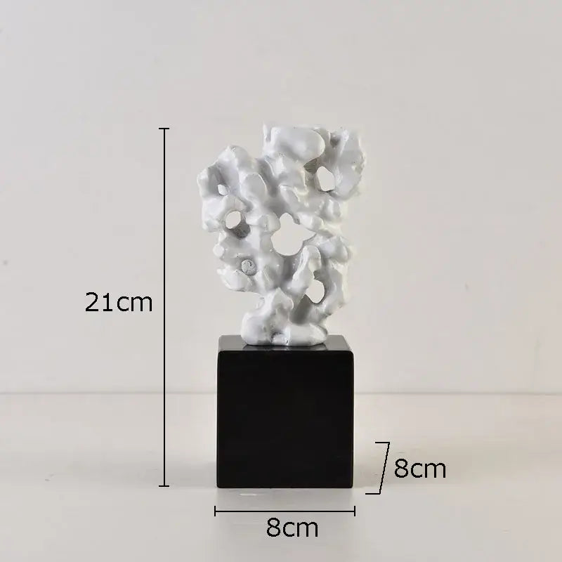 Modern white coral creative resin sculpture with organic porous form on black base for living room decor