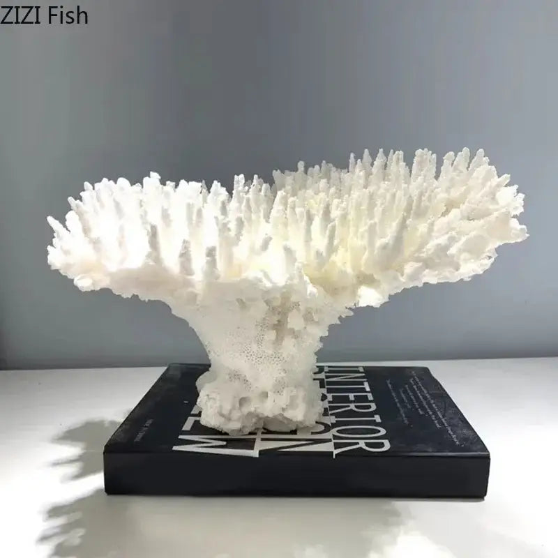 Modern white coral tree decorative ornament with intricate branching texture resting on a black book decorbites coral tree