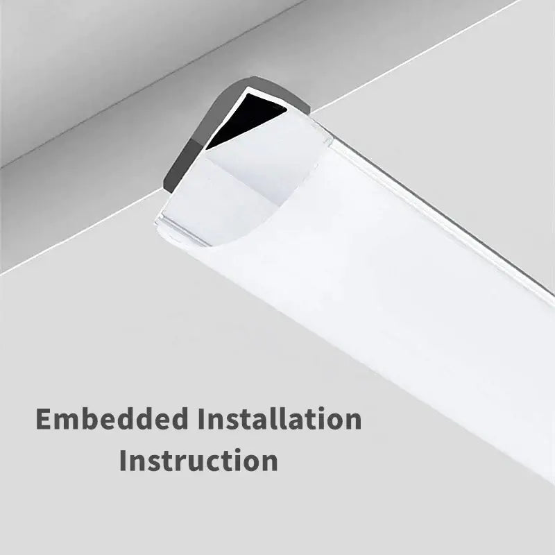 Modern white corner aluminum profile with black trim for led strip lights in kitchen with sleek design