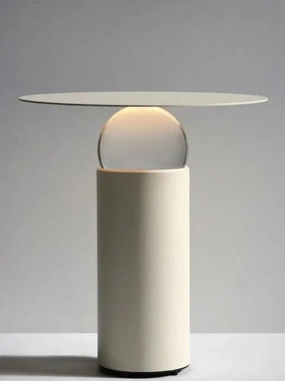 Modern white crystal ball table lamp with sleek cylindrical base and warm light glass sphere for minimalist decorbites crystal ball decor