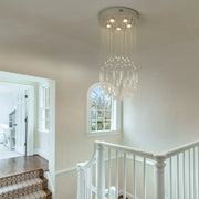 Modern white crystal ring pendant chandelier with circular metal base and cascading glass droplets for dining room decorbites crystal ring