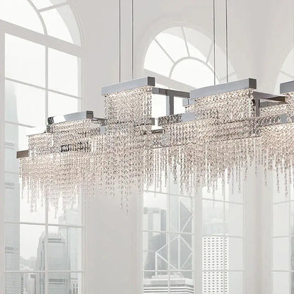 Modern white crystal tassel chandelier with chrome finish and cascading crystal droplets for dining room decorbites crystal tassel lighting