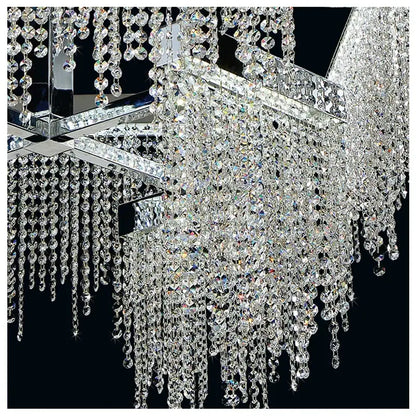 Modern white crystal tassel chandelier with chrome frame and clear crystals for elegant dining room decorbites crystal tassel