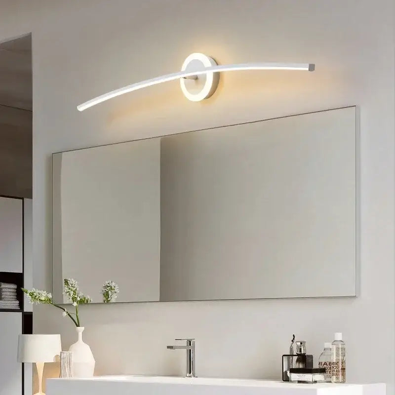 Modern white curved led wall lamp with sleek finish and circular base emitting warm light for bathroom and living room