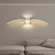 Modern white curved led wall light strip with sleek arms emitting warm glow for decorbites led wall sconce decor