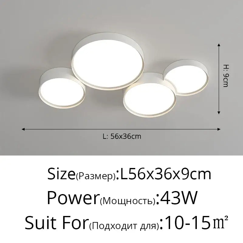 Modern white cylinder led chandelier light with four overlapping circular disc lamps ideal for living room decorbites cylinder led