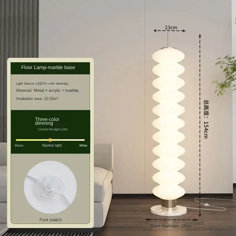 A modern white floor lamp with a wavy acrylic and marble base from decorbites cream sugar gourd collection