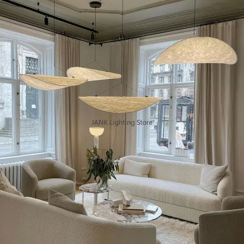 Three elegant cream semi-circular cloth cover pendant lights with woven fabric finish for bedroom decorbites designer cloth chandelier