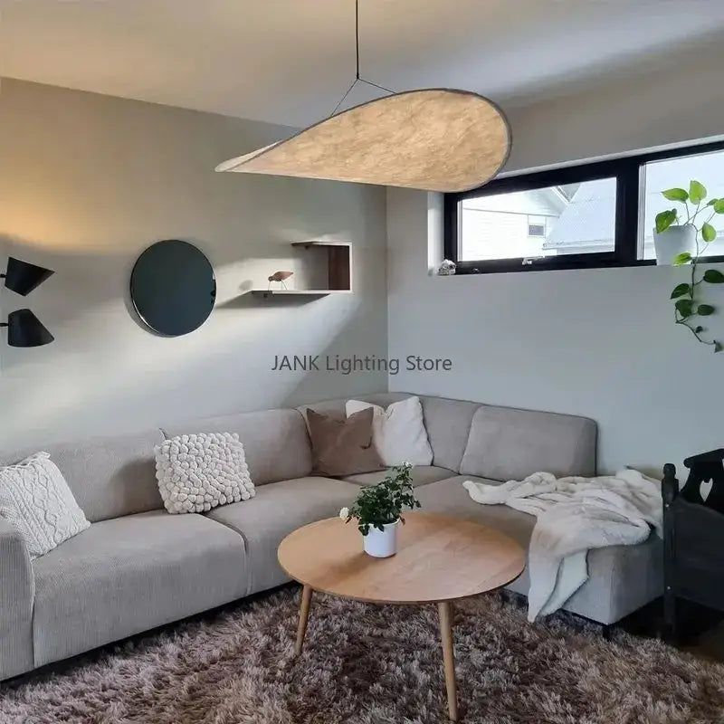 A modern white designer cloth cover pendant chandelier with warm beige fabric shade for bedroom decorbites designer cloth