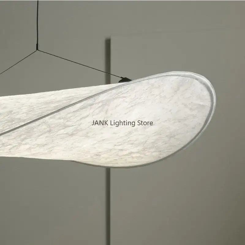 Modern white designer cloth cover pendant chandelier with soft fabric shade and sleek black suspension wires for bedroom decorbites designer cloth