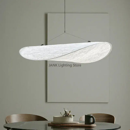 A modern white cloth cover pendant chandelier with a textured swirling design for bedroom decorbites designer cloth