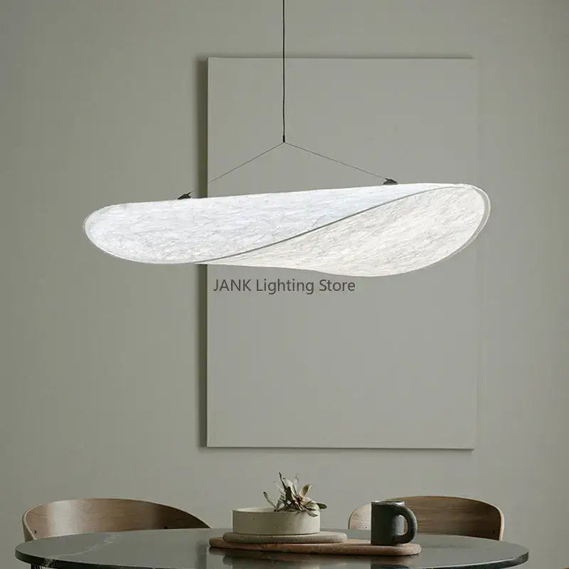 A modern white cloth cover pendant chandelier with a textured swirling design for bedroom decorbites designer cloth