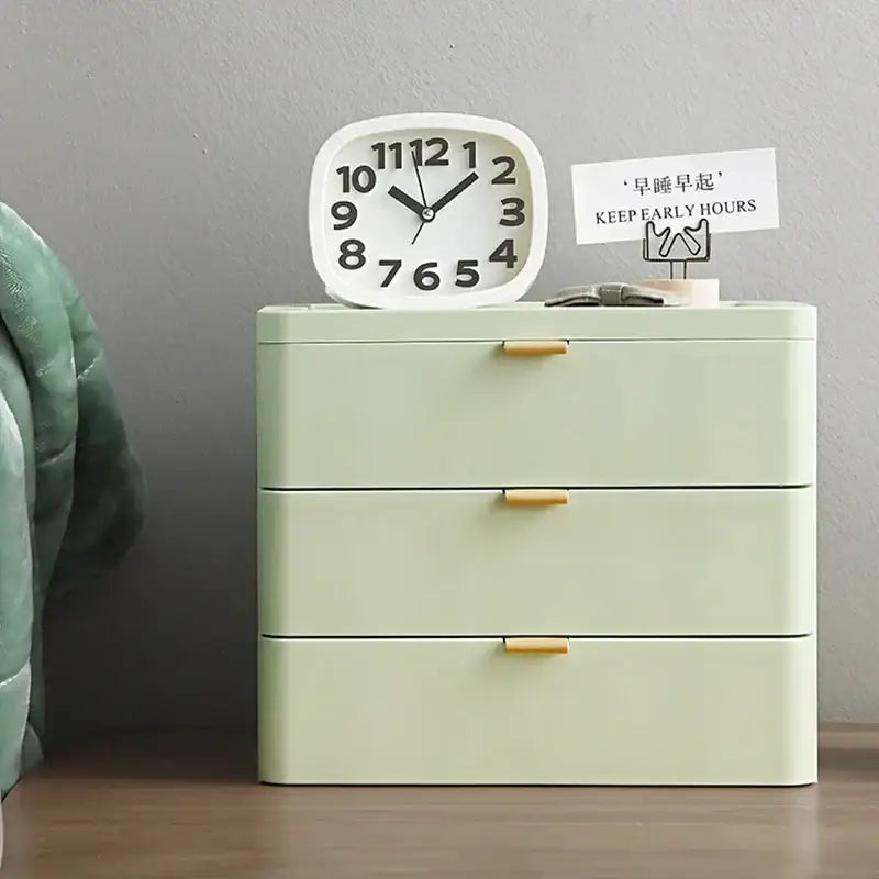 Pastel green plastic decorbites desktop organizer drawer with three drawers and light wood-tone handles for bedroom use