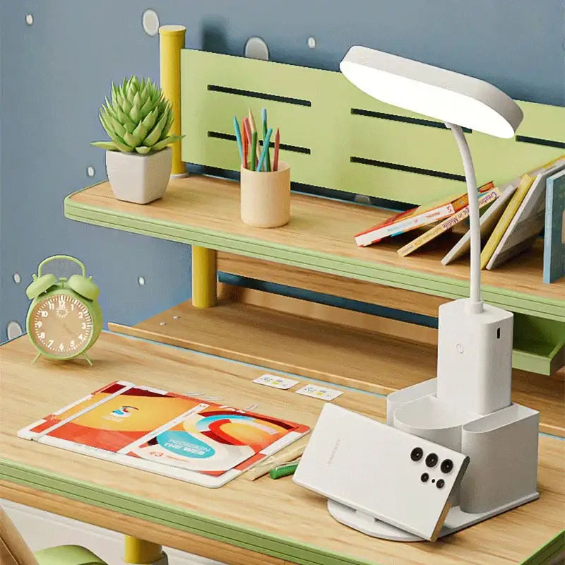 Modern white dimmable led desk lamp with adjustable arm, integrated phone stand, and pen holder for bedroom decorbites dimmable led