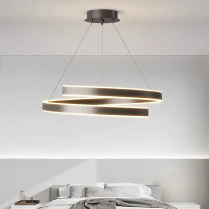 Modern white dimmable metal acrylic pendant ring light with two interlocking rings emitting warm glow for dining room decorbites dimmable metal