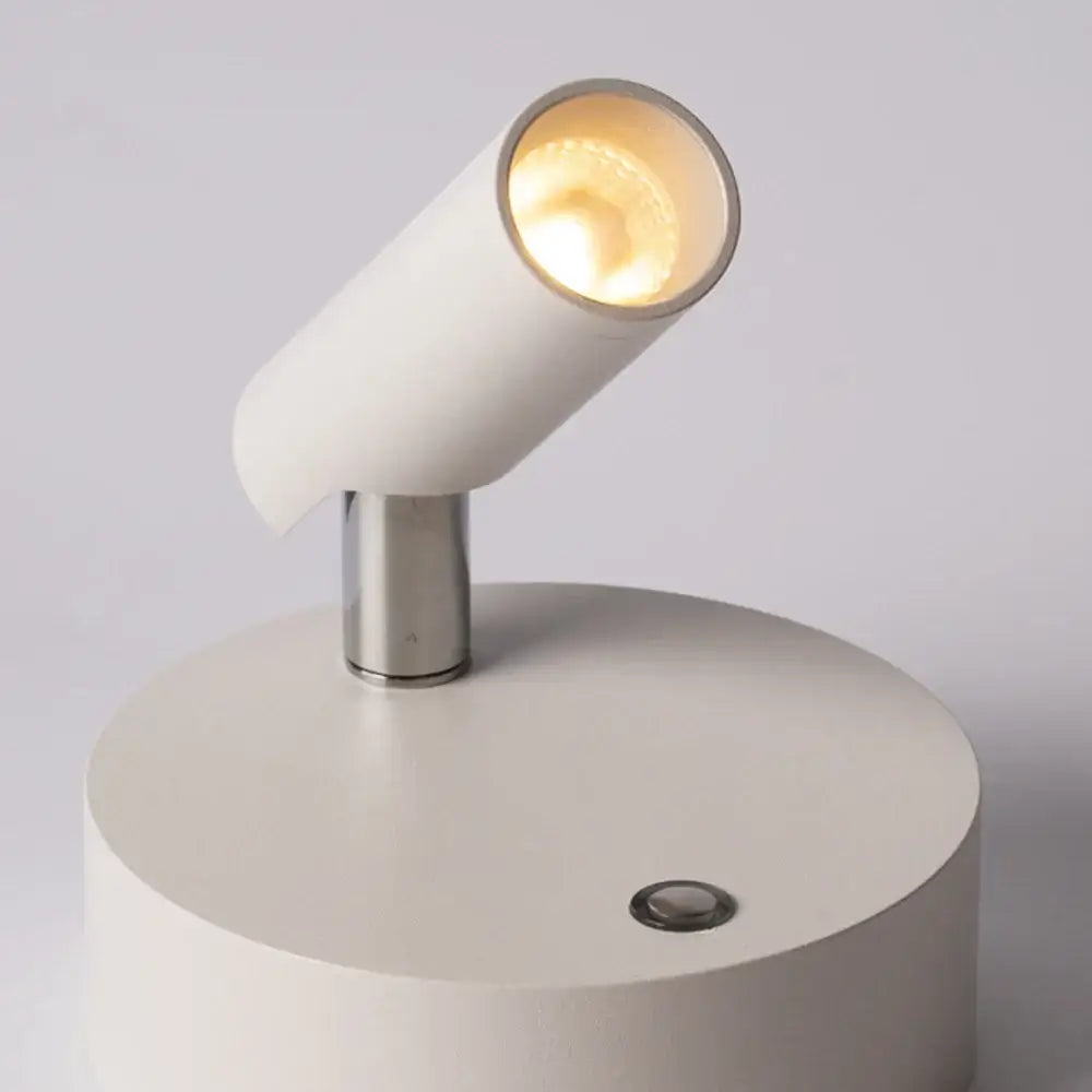 Modern white dimmable wireless wall mounted spotlight with metallic base and warm focused illumination for bedroom decorbites dimmable wireless