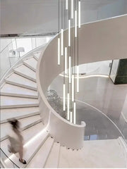 Modern white duplex loft led chandelier with sleek cylindrical tubes in a cascading stairway pendant light decorbites duplex loft