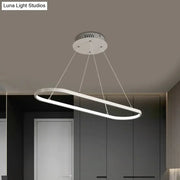 Modern oval-shaped led ceiling light with ellipse metal shade in black and white featuring warm white bulb base lighting