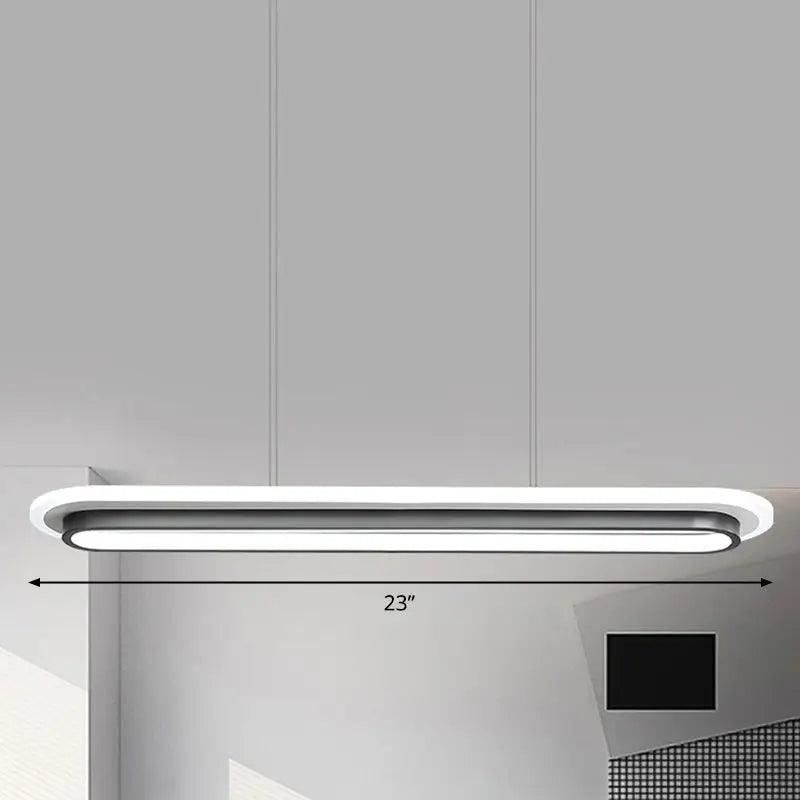 Modern minimalist pendant light with sleek white elliptical island design in black and white acrylic for table lighting
