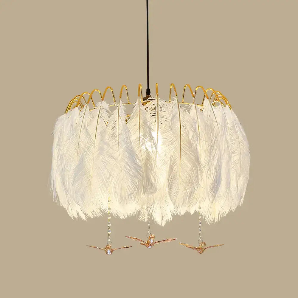 Elegant modern white feather chandelier with gold wire frame and dangling bird ornaments for living room pendant light