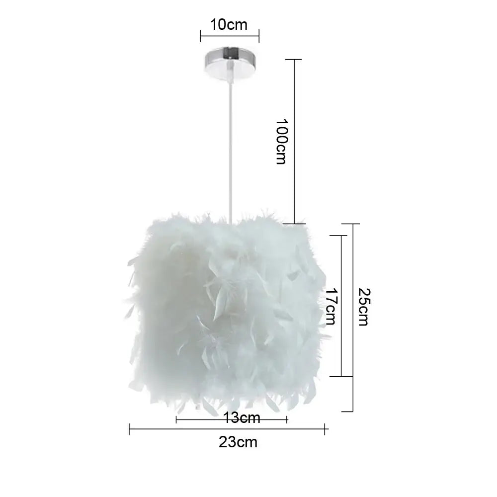 Modern white feather pendant light with cylindrical shade and chrome finish ceiling mount for bedroom lighting
