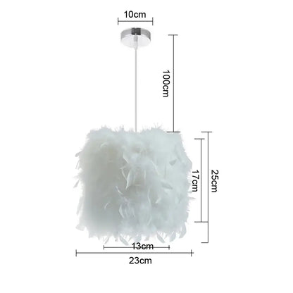 Modern white feather pendant light with cylindrical shade and chrome finish ceiling mount for bedroom lighting