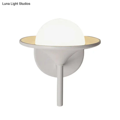 Modern white flared sconce light with white spherical globe and gold ring mounted on minimalist bedroom wall fixture 110v-120v