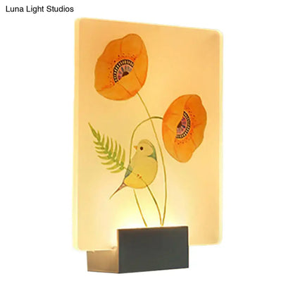 A warm glowing modern white flower bird wall lamp with orange poppies on translucent material corner led mural