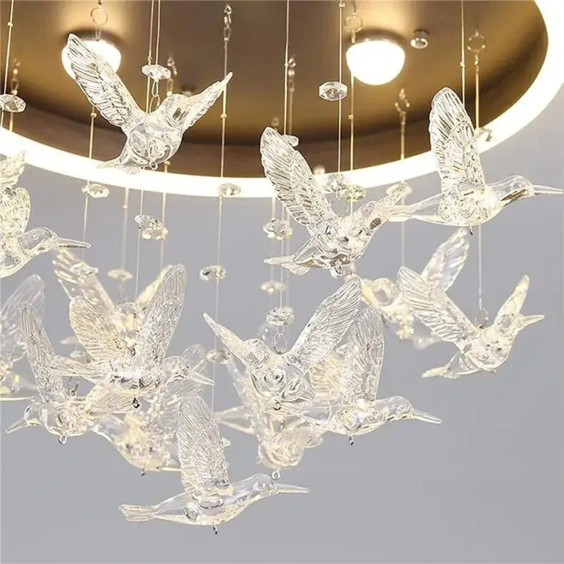 Modern white flying bird ceiling light with clear glass hummingbird design and crystal accents for kids bedroom decorbites flying bird ceiling