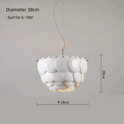 Modern white french ceramic chandelier pendant light with layered shell design and beige cord by decorbites french ceramic