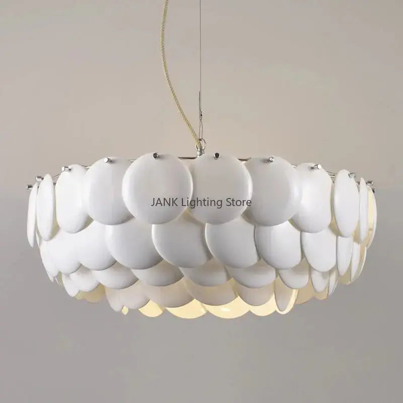 Modern white french ceramic chandelier pendant light with a layered circular disc design by decorbites french ceramic
