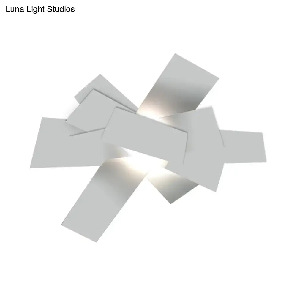 Modern white geometric ceiling light with overlapping rectangular panels and 110v-120v bulb base for bedroom use