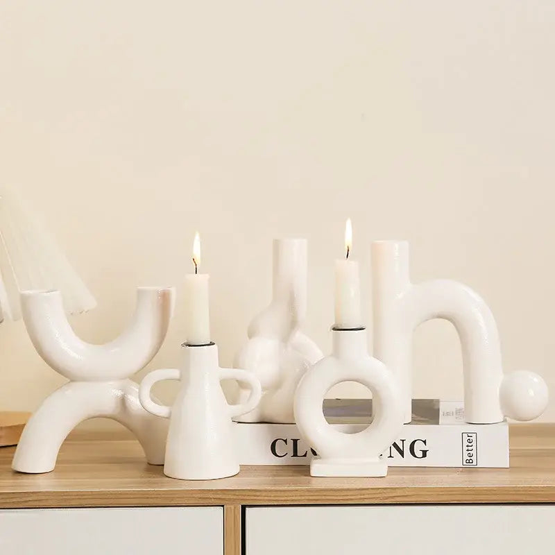 Modern white geometric ceramic candle holders with smooth abstract designs for living room decorbites geometric ceramic decor