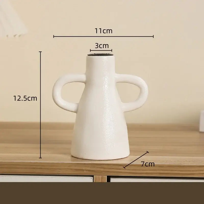 Modern white geometric ceramic candle holder with two symmetrical handles matte finish for living room decorbites decor