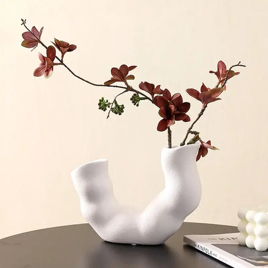 Modern white geometric ceramic flower vase with a unique organic u-shaped design for living room decorbites decor