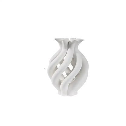 A sleek white geometric ceramic hollow vase with three twisted necks for modern living room decorbites decor