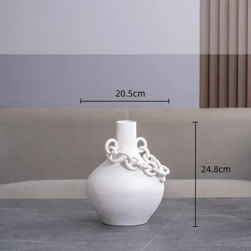 Modern white geometric chain porcelain vase with rounded body and slender neck for living room decor by decorbites