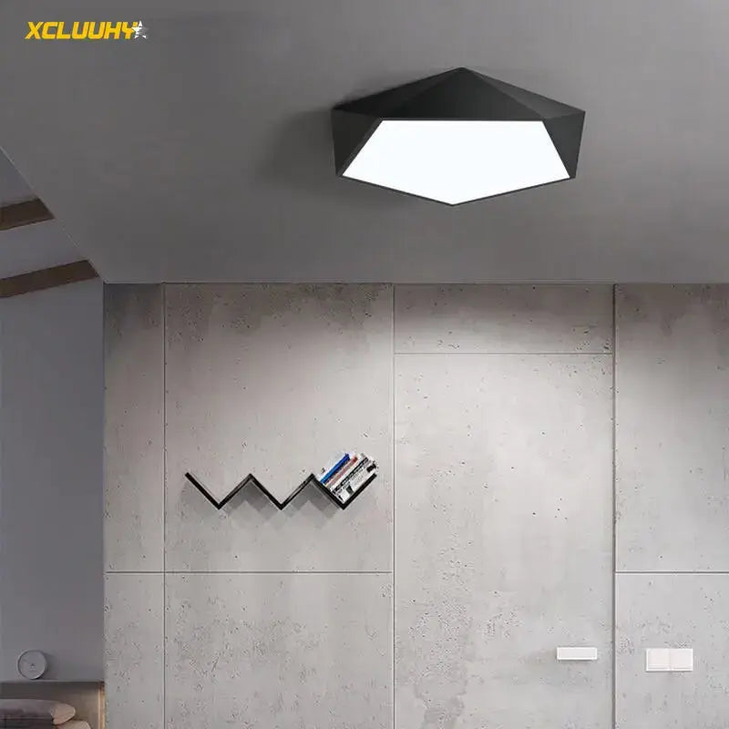 Modern white geometric LED ceiling lamp with black hexagonal matte finish for stylish living room decorbites geometric led lighting