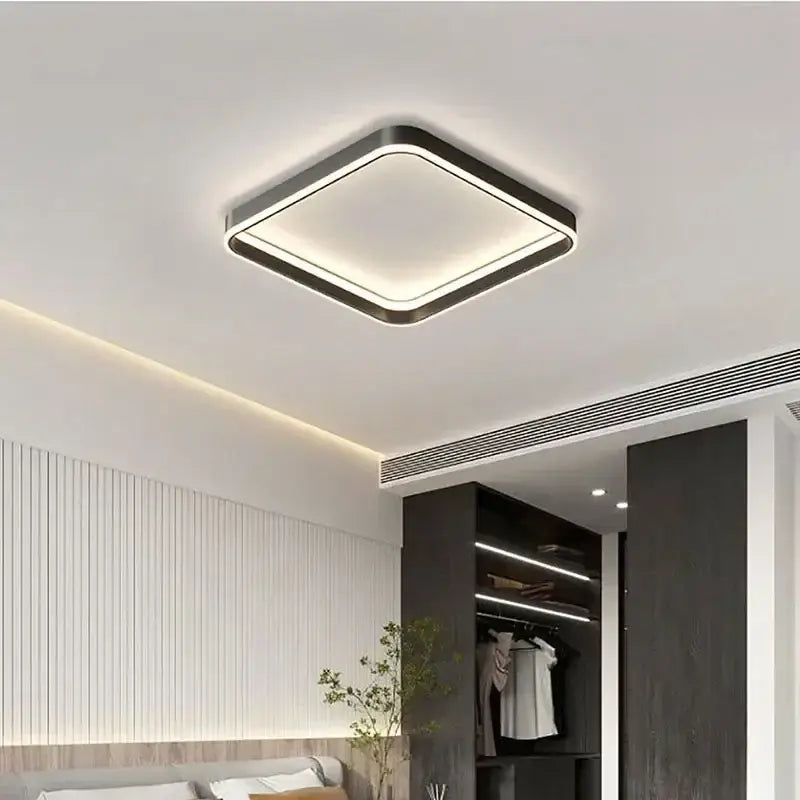 Modern white geometric led ceiling lamp with sleek black frame and glowing decorbites geometric led ceiling illumination