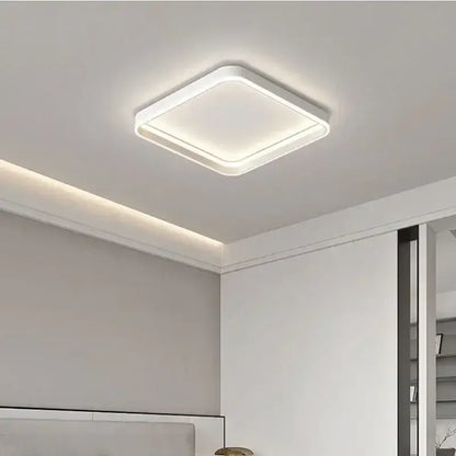 Modern white geometric led ceiling lamp with sleek minimalist design and soft ambient glow for living room decorbites ceiling lamp