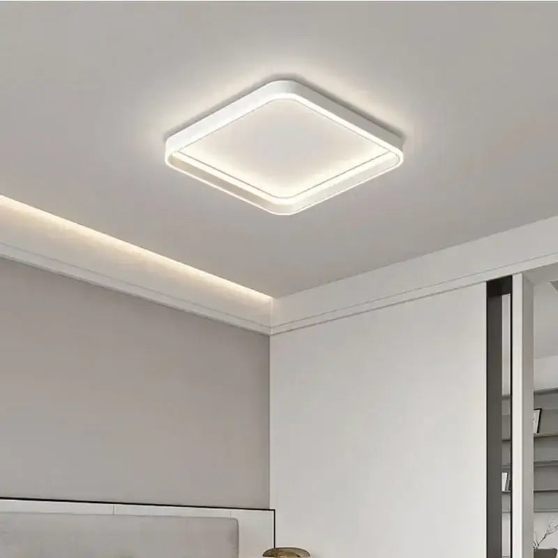 Modern white geometric led ceiling lamp with sleek minimalist design and soft ambient glow for living room decorbites ceiling lamp